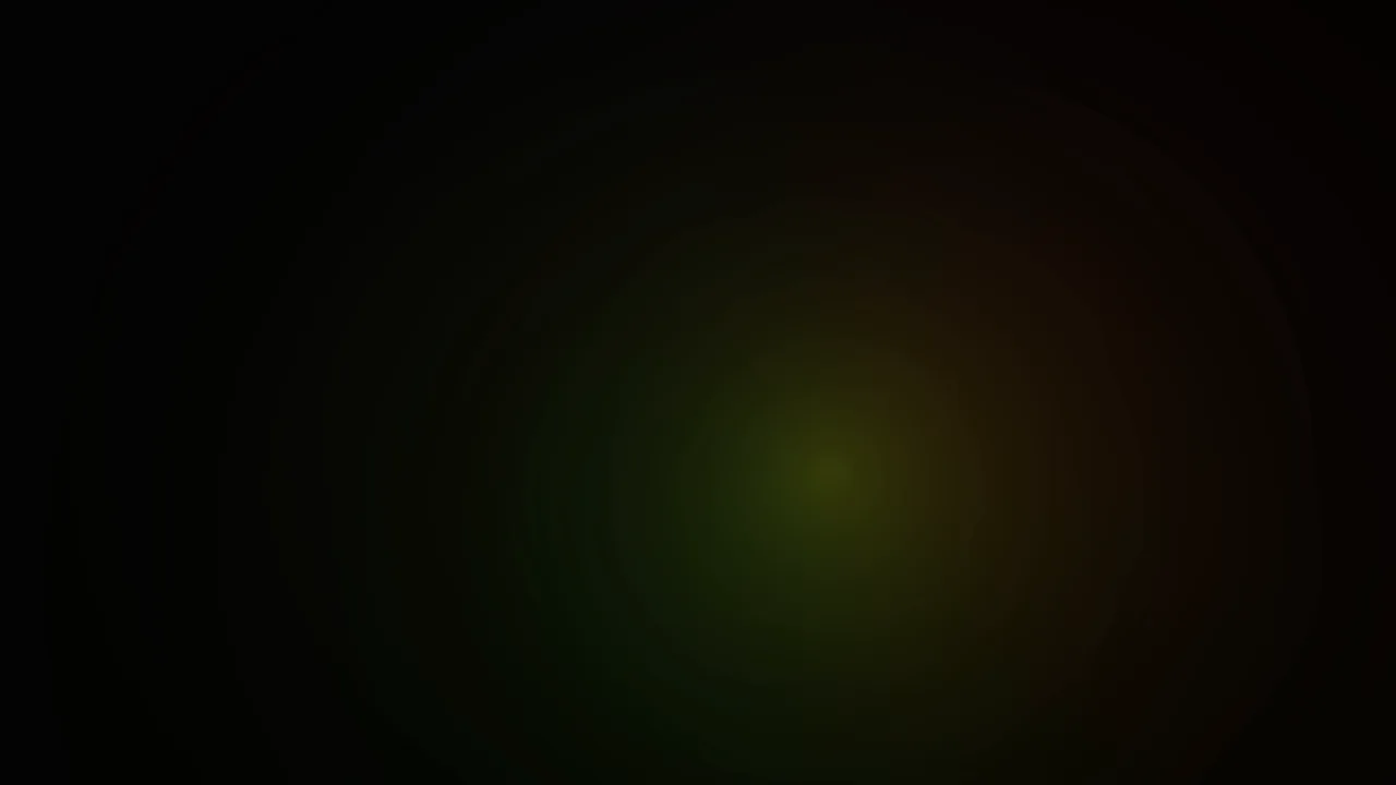 Abstract Green and Amber Radial Glow on Black 4K Wallpaper
