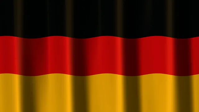 German Flag Fabric Folds in Black, Red and Gold — 4K Wallpaper