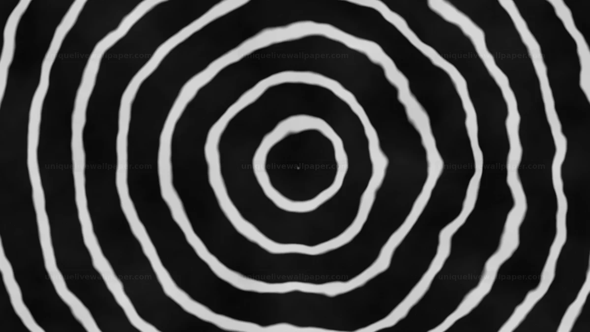 Black and white expanding rings background creates dynamic visual flow